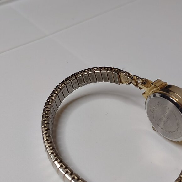 Pretty 6 Inch Gold Tone Stretch Watch With Clear Stones - Picture 8 of 13